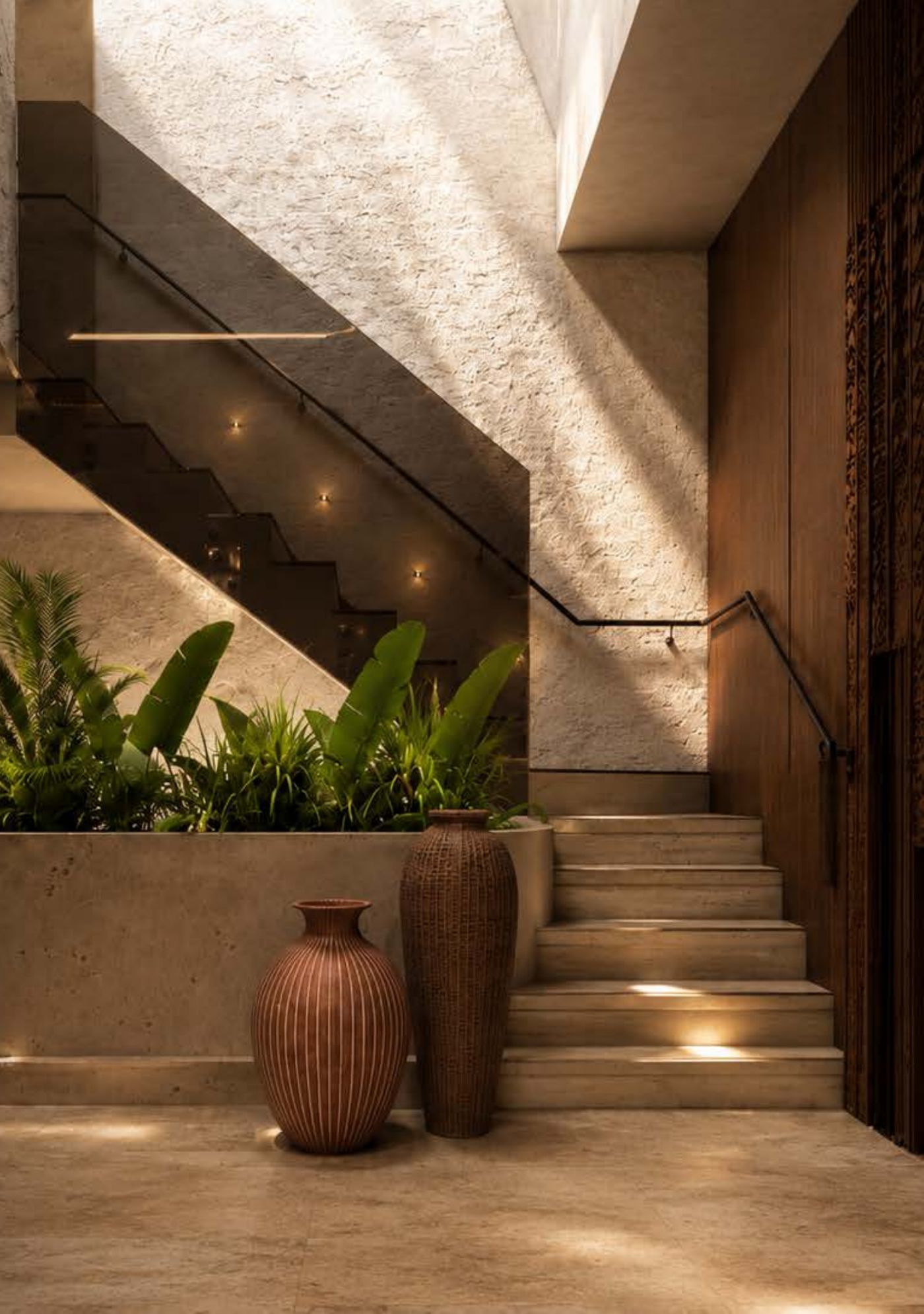 Sunlit stair hall with clay vessels