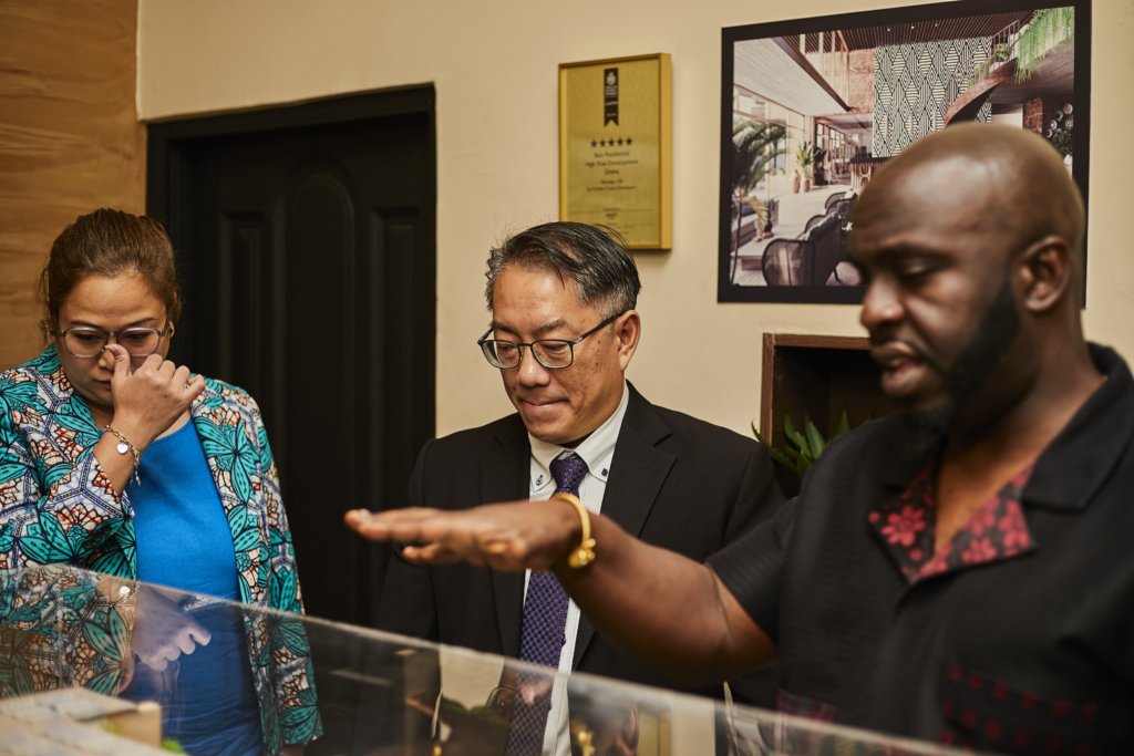 Neil Oku walking the delegation through the Heritage 100 model